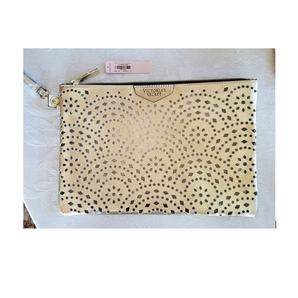 NWT Victoria’s Secret cutout clutch, makeup or bathing suit bag in Gold – New !!